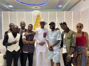 Skales and some young artists visit new PMAN headquarters